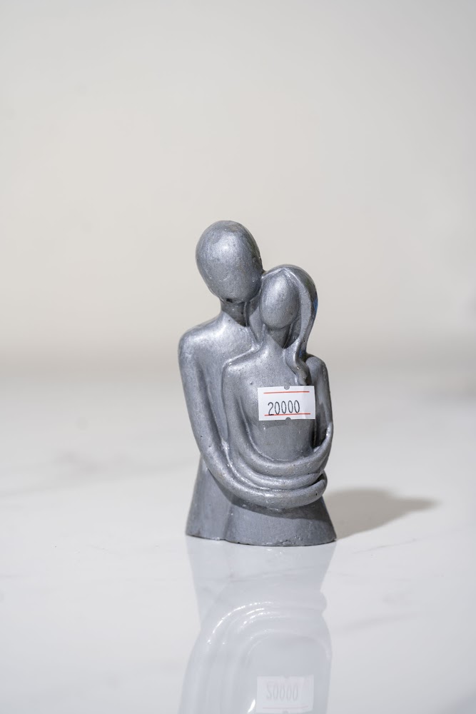 Silver Resin Embracing Couple Figurine